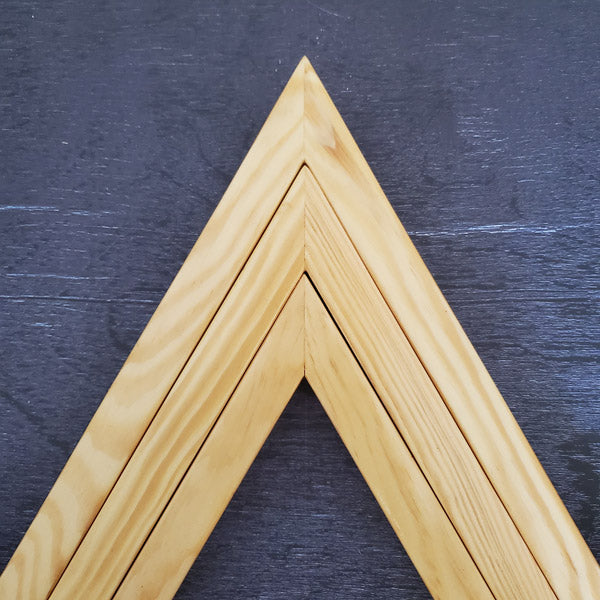 A set of three wooden triangles to hang on the living /dining or bed room wall. The set comes in three different sizes of triangles which could be arranged in multiple ways to suit your style. Made out of pinewood or mahogany gives the décor a beautiful color, and will go well on the walls that is either painted with light colors or dark colors. Triangle is the most significant, because of the inherent power of its form. There are 3 in the set and as number 3 is the most significant of all the numbers.